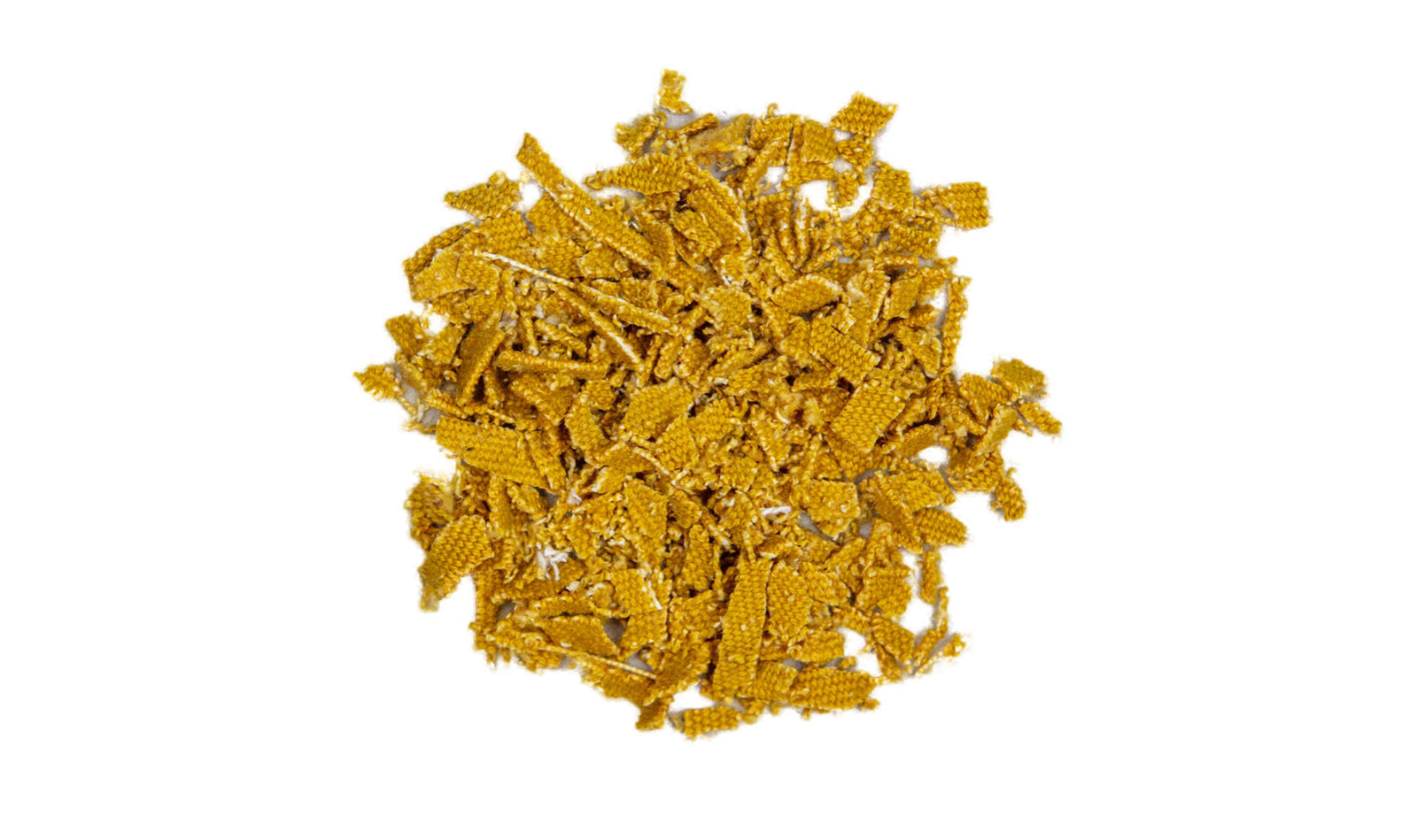 gelbes Textil in Kleinteile zerteilt und gehäuft 